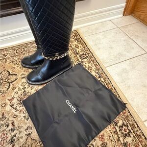 CHANEL Black Quilted Leather Boots with Chain Accent
